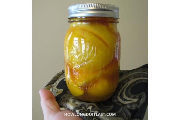 Homemade Canned Peaches stored in Jar